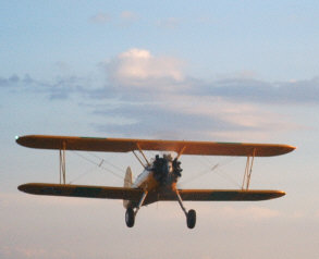 Stearman biplane trainer aloft